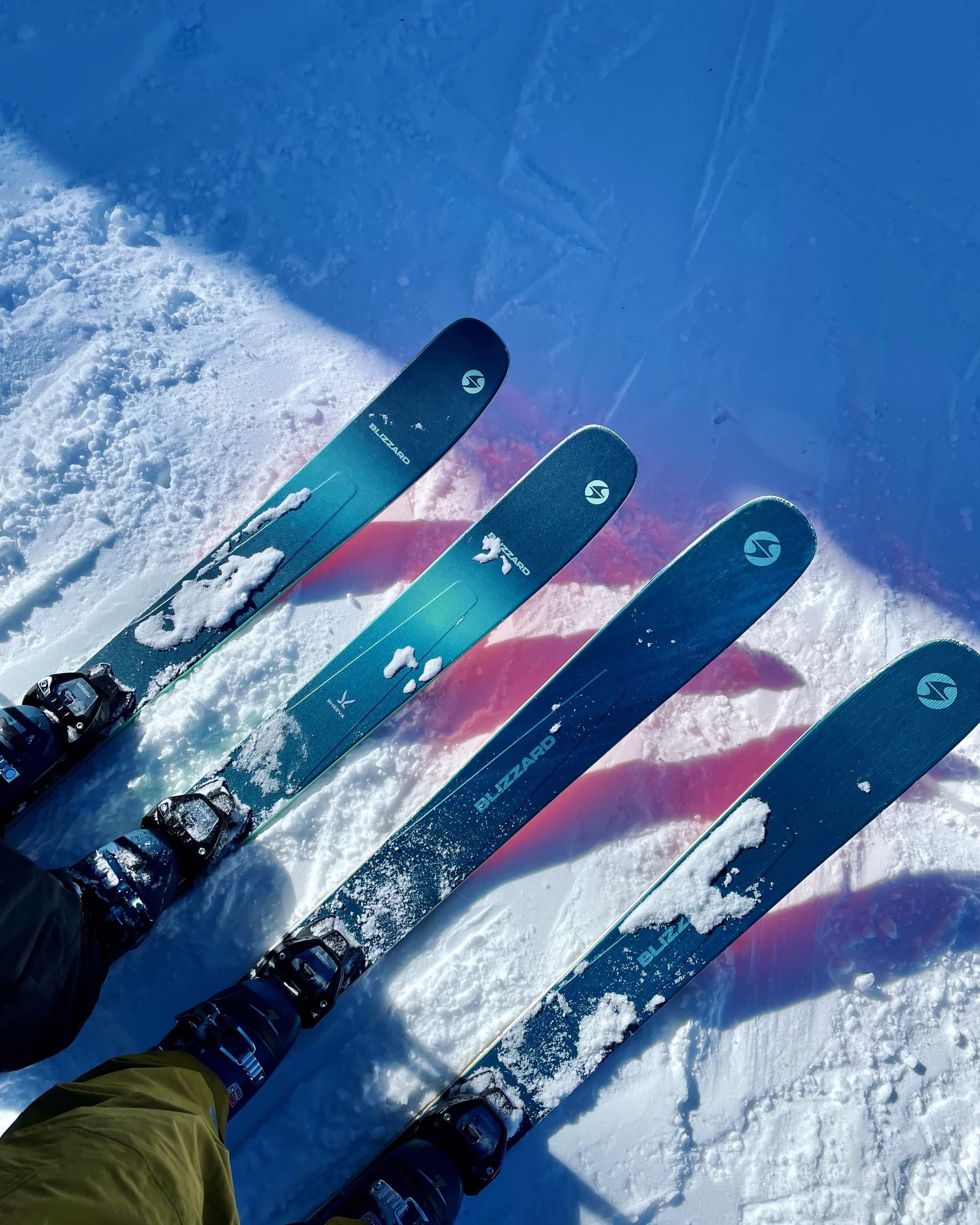 Skis on snow at the top of a run