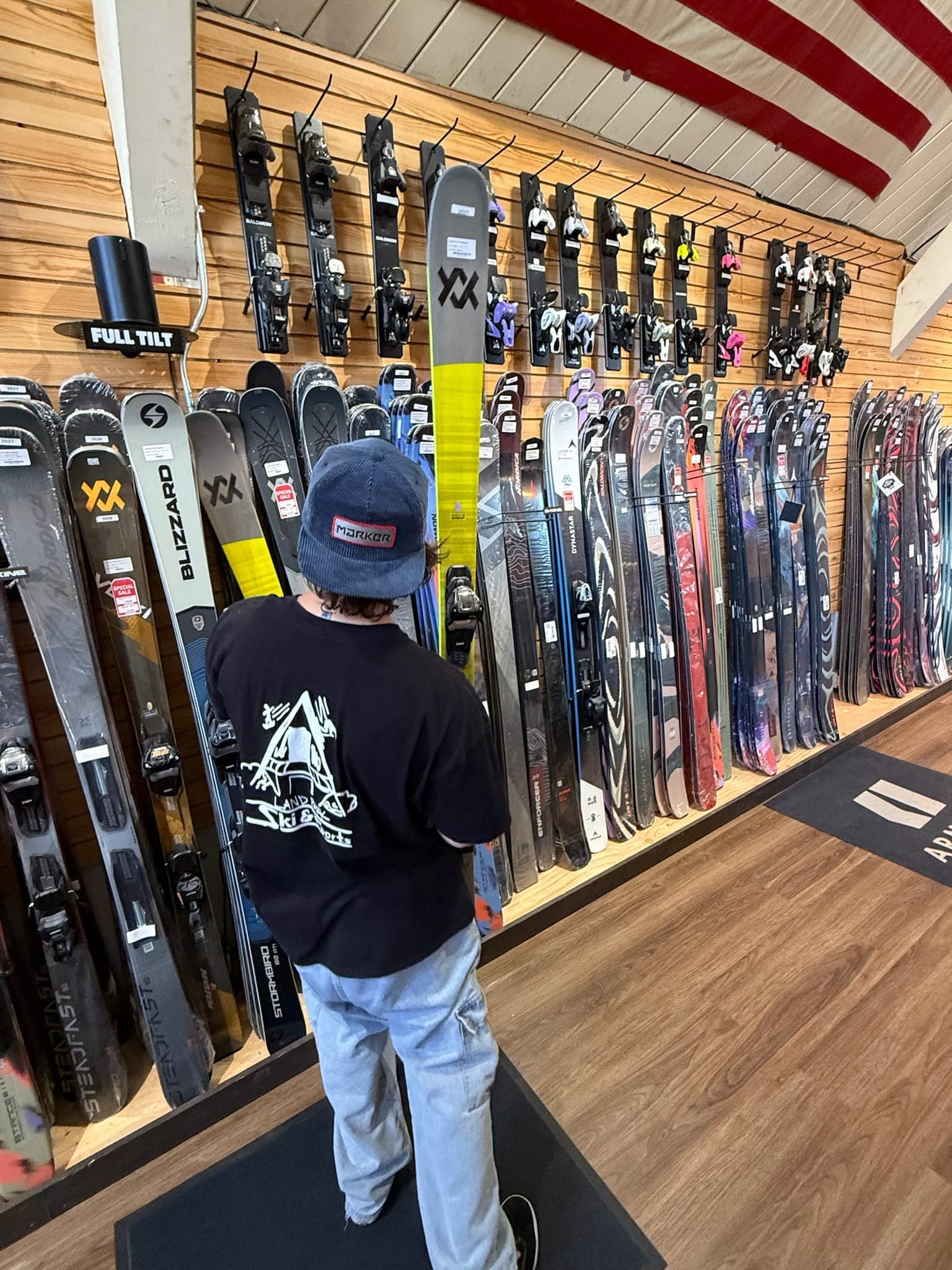 A crew member working the ski wall