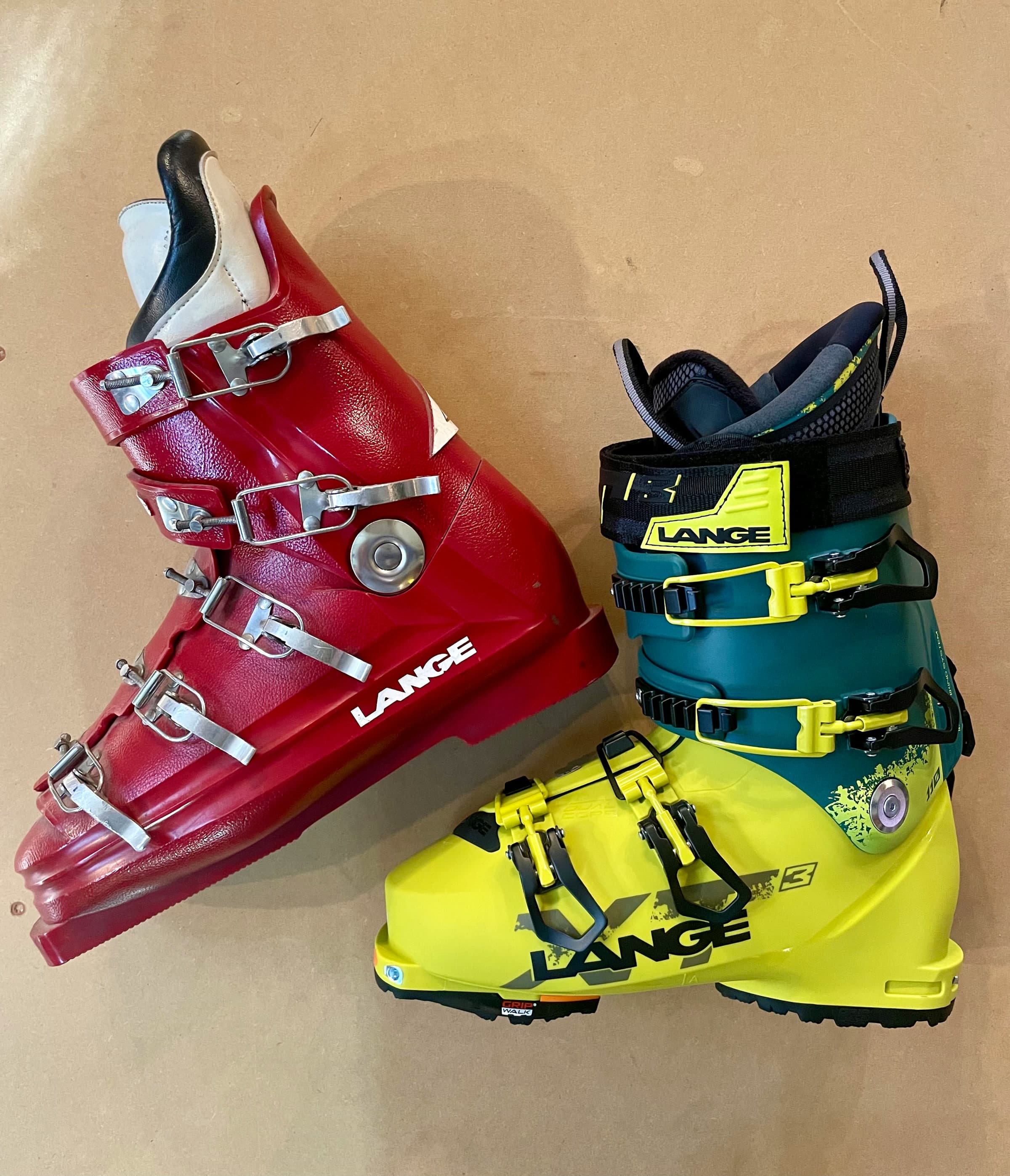 A vintage red Lange boot beside a current Lange boot