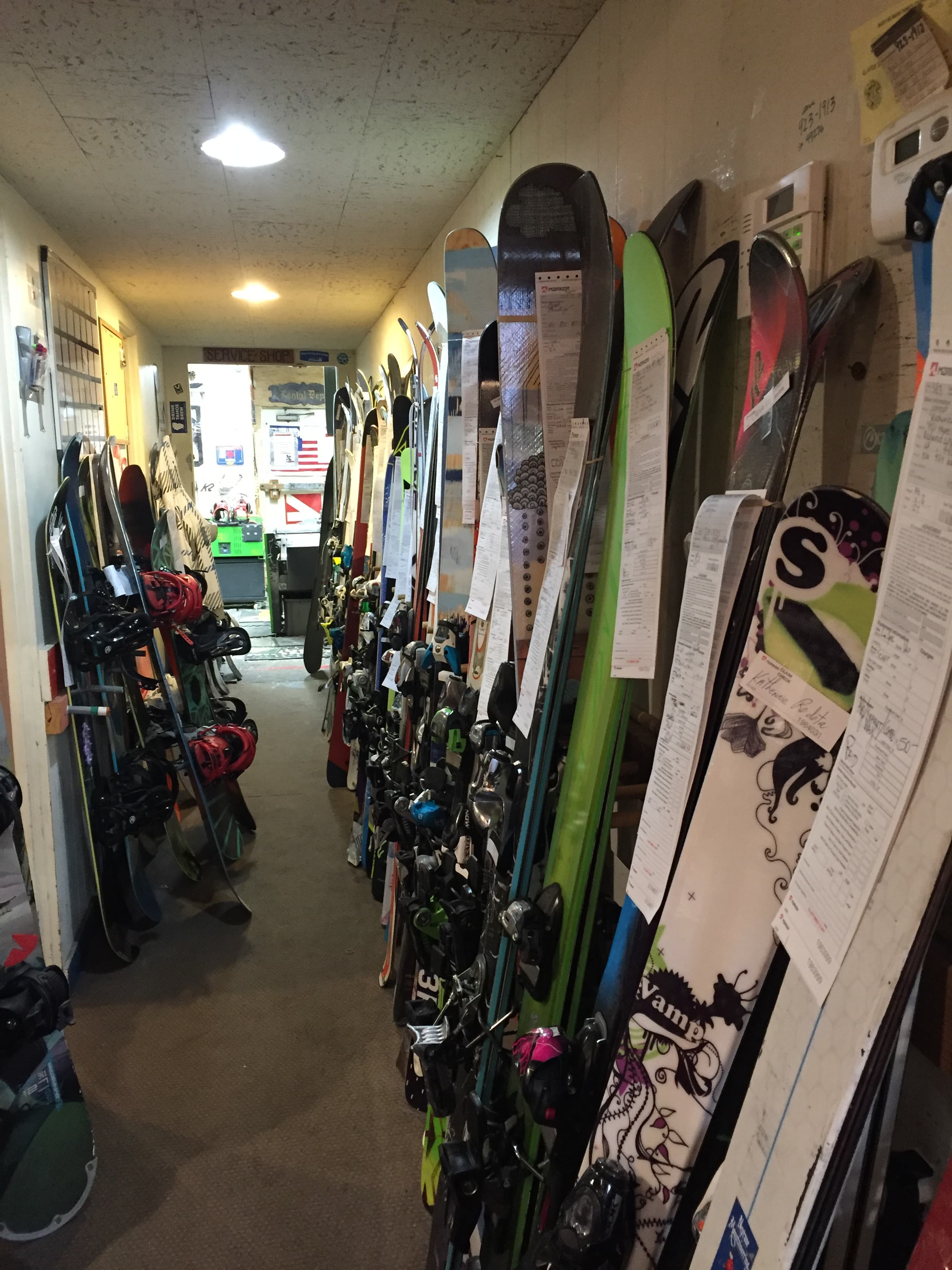 Rental corridor stocked with skis and boards