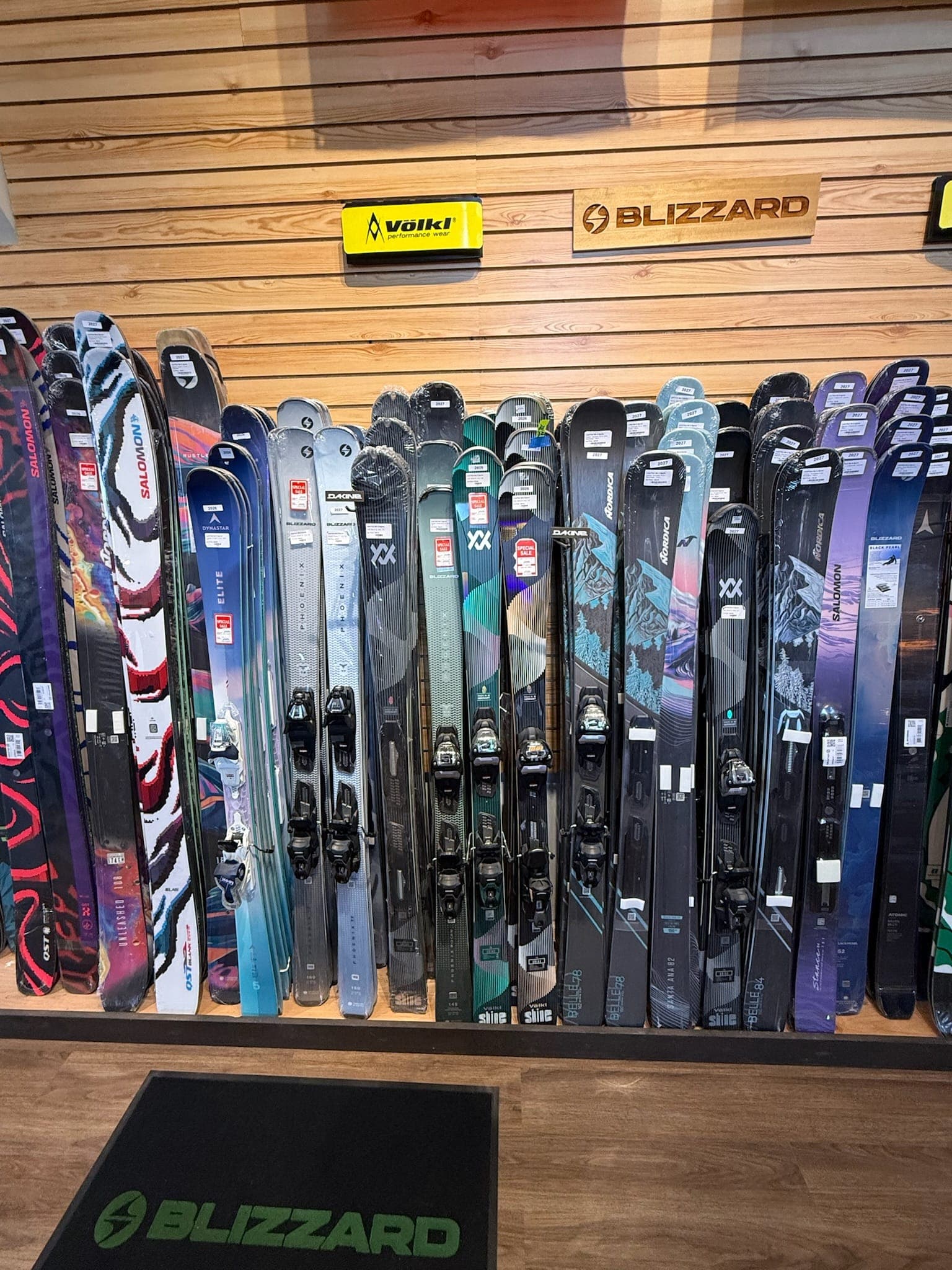 The new-ski wall stocked with Völkl and Blizzard for the season
