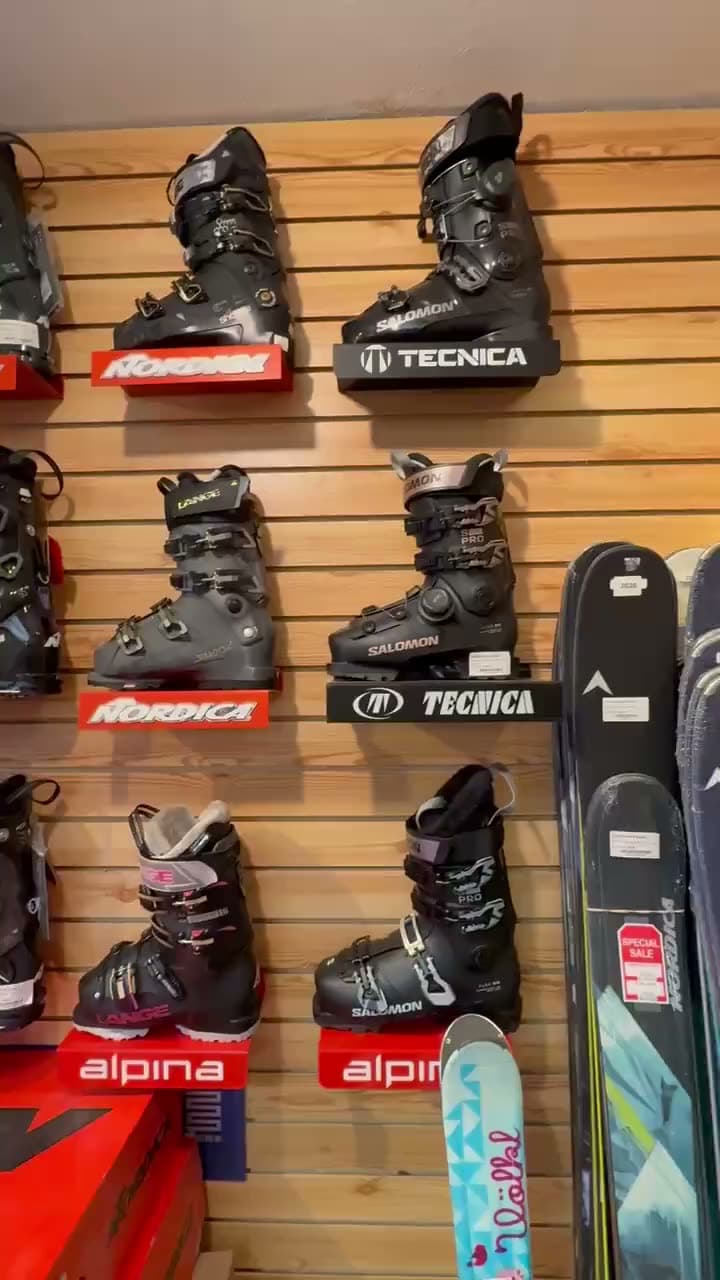 The ski boot wall stocked with Nordica, Tecnica, and Lange